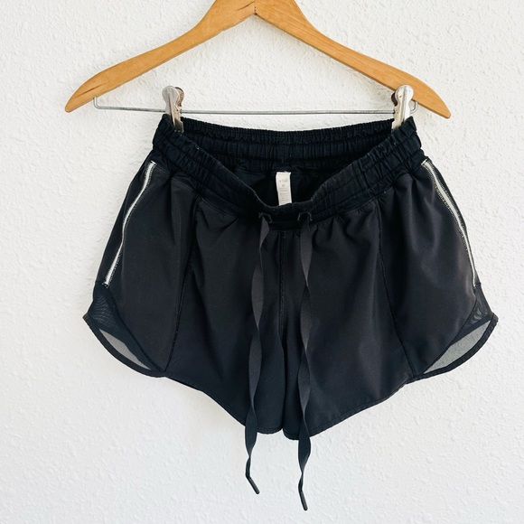 lululemon athletica Pants - Lululemon black hotty hot 4” drawstring running shorts 4